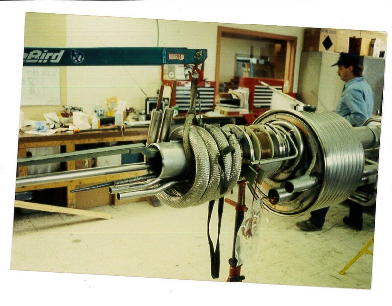 #ThrowbackThursday to this current lead assembly that Meyer Tool made for the Superconducting Super Collider back in the early 90s.  The large coils in the center are solid stainless steel rods in a flexible hose.  This configuration was designed to protect the magnets from overheating in the case of a quench (sudden loss of superconductivity) in the magnets.  By heating the steel and boiling off the liquid helium in the hose, the assembly would prevent thermal damage to the superconducting wires.