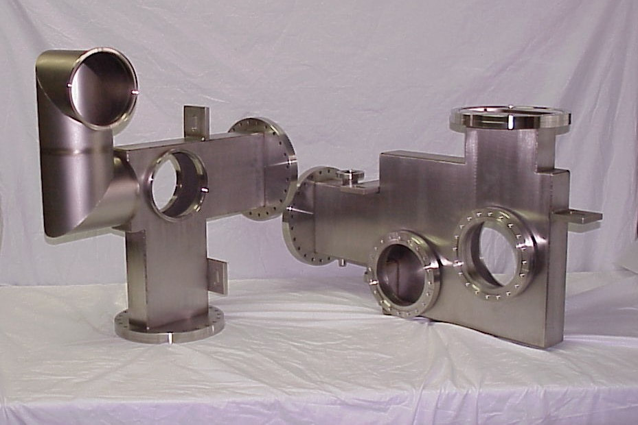 Stainless steel welded construction ultra-high vacuum chambers with unique rectangular sections. 