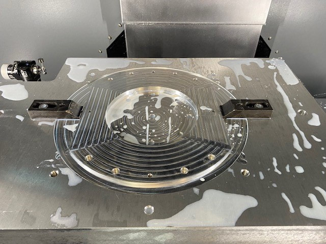 Post weld machining of fiducial datum surfaces on an ASME code pressure vessel.  This vessel was designed to maintain a liquid helium bath around a superconducting solenoid magnet.